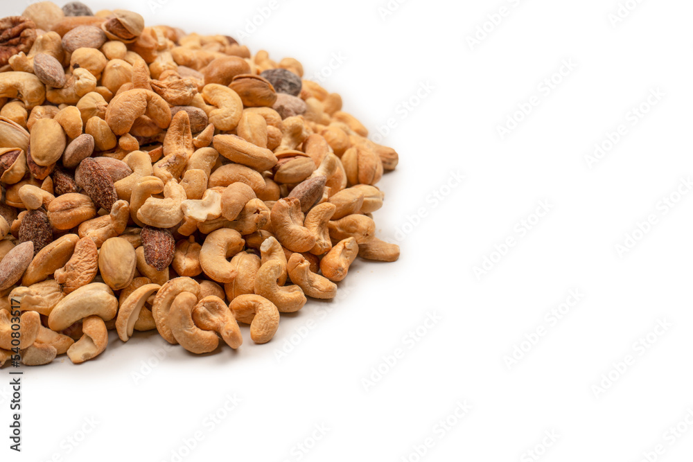 A group of almonds, pistachios, walnuts, macadamia, cashews. A group of almonds, pistachios, walnuts, macadamia, cashews.