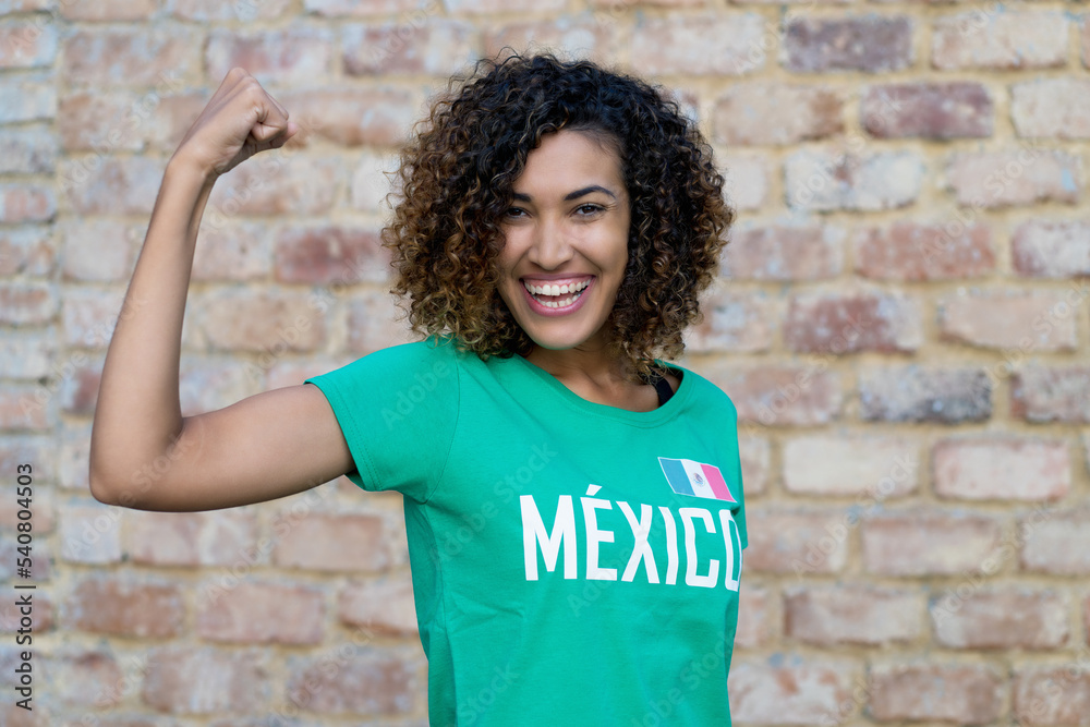 Optimistic mexican female football fan Optimistic mexican female football fan