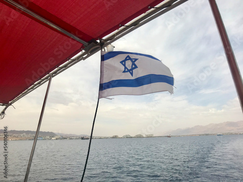 Eilat, Israel, November 2019 - A boat on a body of water
