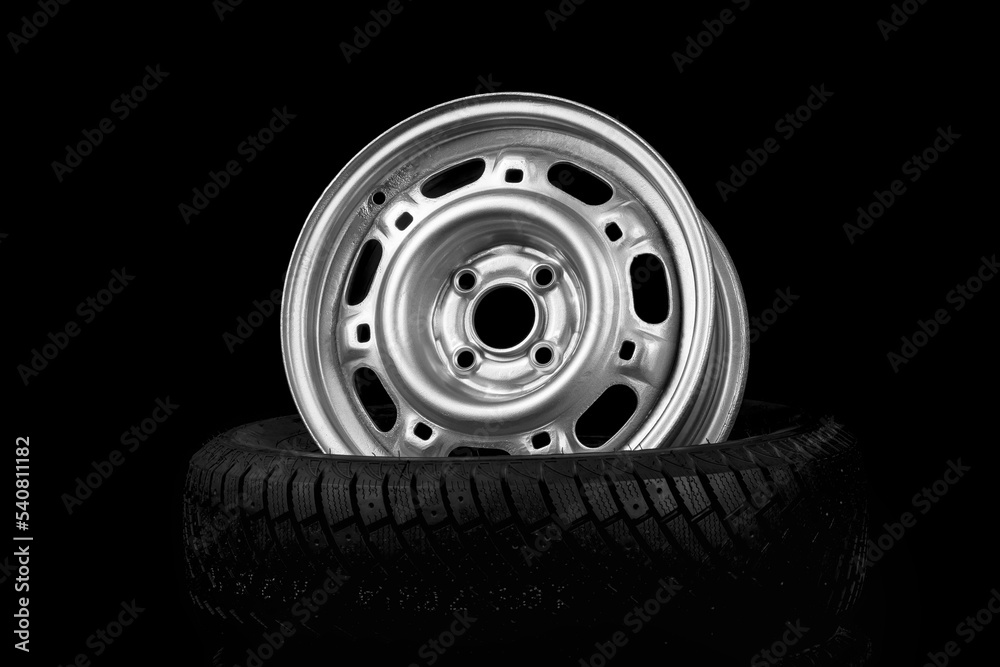 Obraz premium Black Stylish Metallic Shiny Car Rim on Car Tires