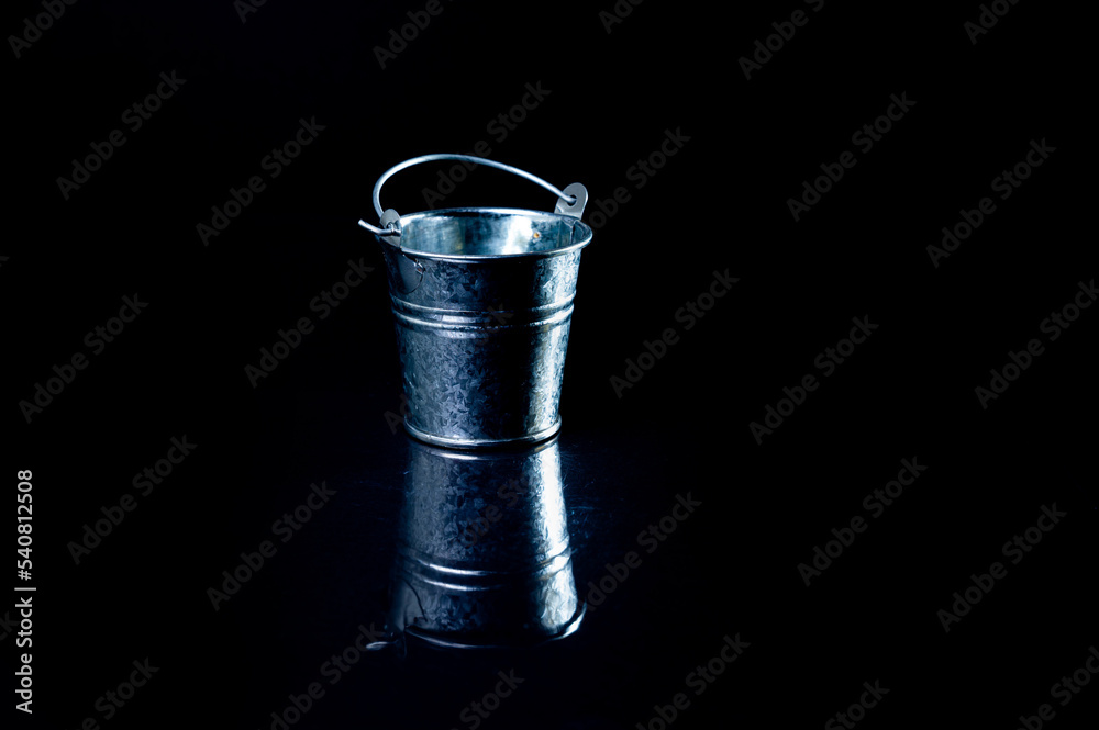 aluminum ice bucket laid in wait for use. stainless multi-colored bucket aluminum ice bucket laid in wait for use. stainless multi-colored bucket