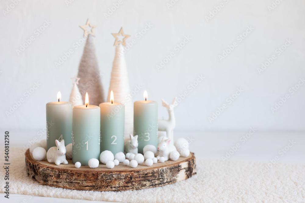 Handmade modern advent wreath with four candles lit every sunday before  christmas. Traditional diy xristmas decoration Stock Photo | Adobe Stock