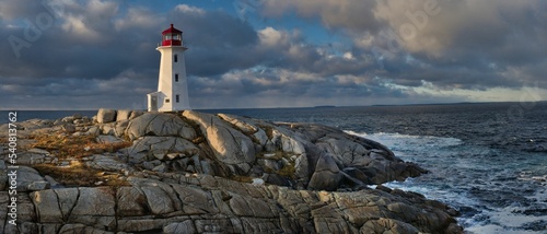 Panoramic shot of a beacon near a seashore in peggy's cove