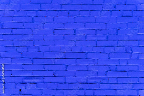 Abstract blue brick wall background close up