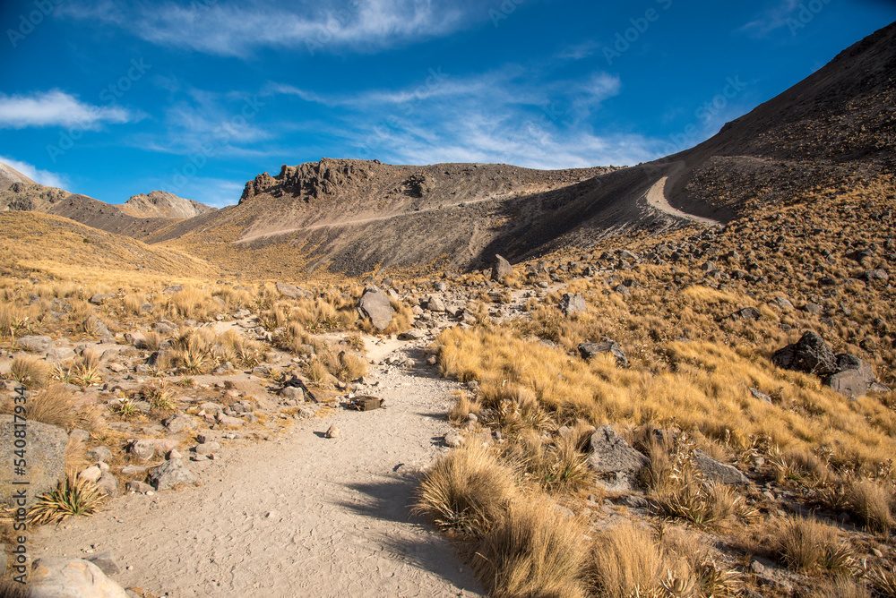 View inside of Volcano Nevado de Toluca National park with lakes inside the crater in Mexico in the morning blue sky - landscape near of Mexico City - Xinantecatl