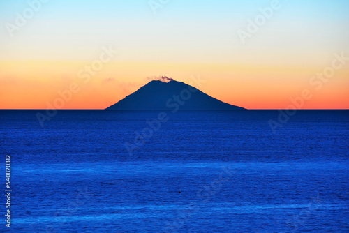 sunset of the volcano Stromboli seen from capo vaticano italy