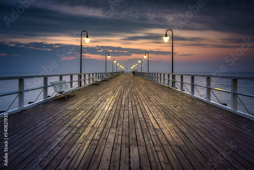 Baltic Sea pier in Gdynia Orlowo at sunrise, Poland © Patryk Kosmider