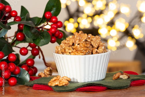 two bowl filled with almonds and raisins - christmas
