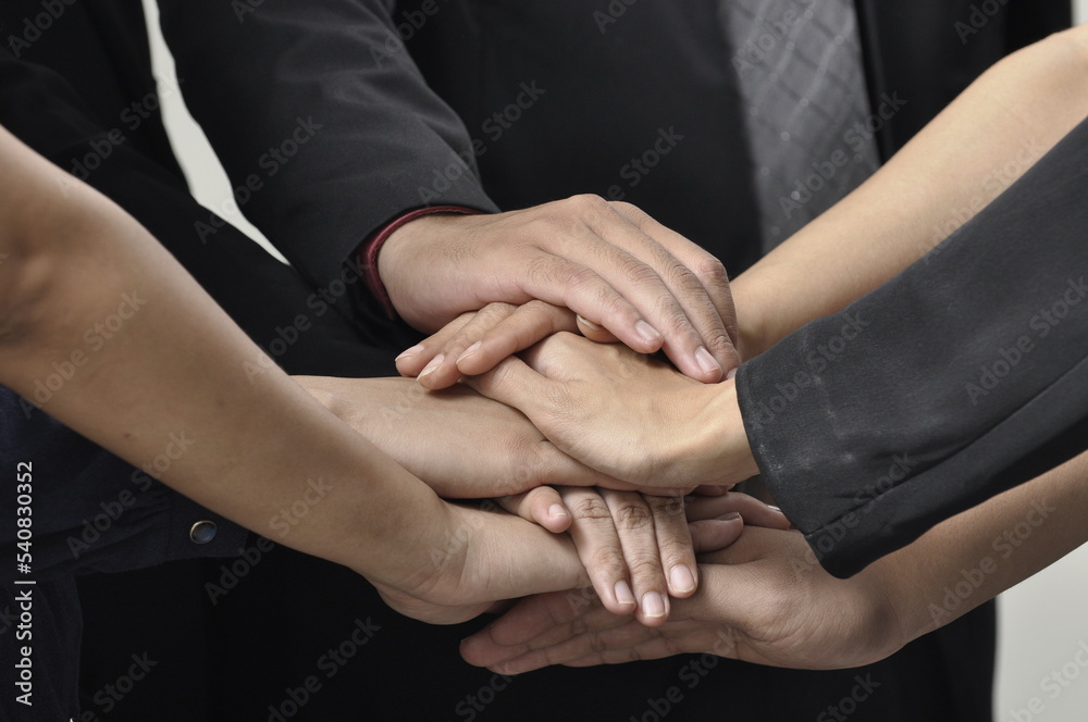 close up of business people hands, conceptual images for teamwork close up of business people hands, conceptual images for teamwork