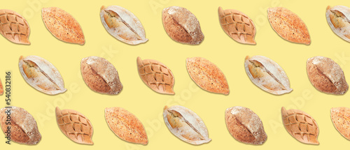 Many loaves of bread on yellow background. Banner for design