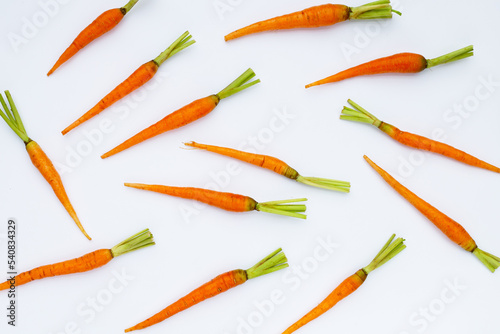 Fresh carrots on white background.