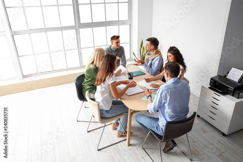Business co-workers having meeting in office