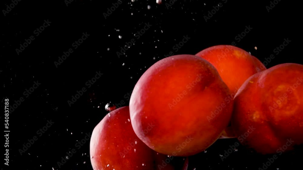 peaches in water, slowmotion