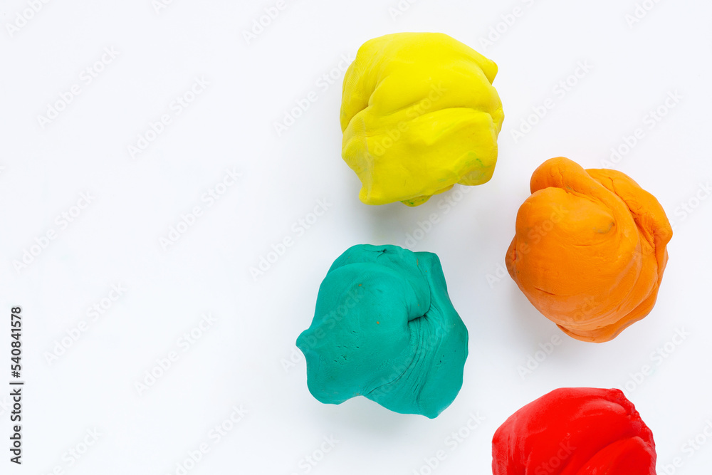 Colorful plasticine clay on white background. Colorful plasticine clay on white background.