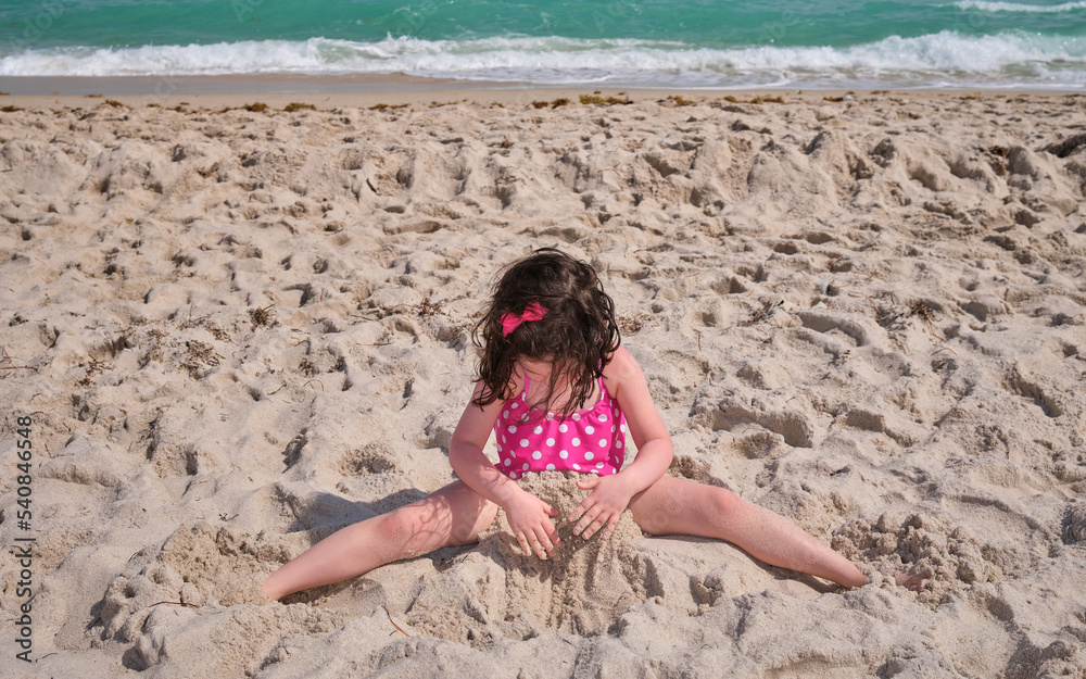 cute young girl playing and fooling around at the beach while making faces cute young girl playing and fooling around at the beach while making faces