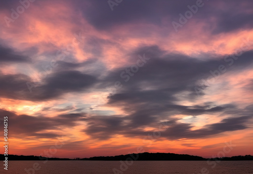 Beautiful sunset sky background with bold colors  © Davis Brown