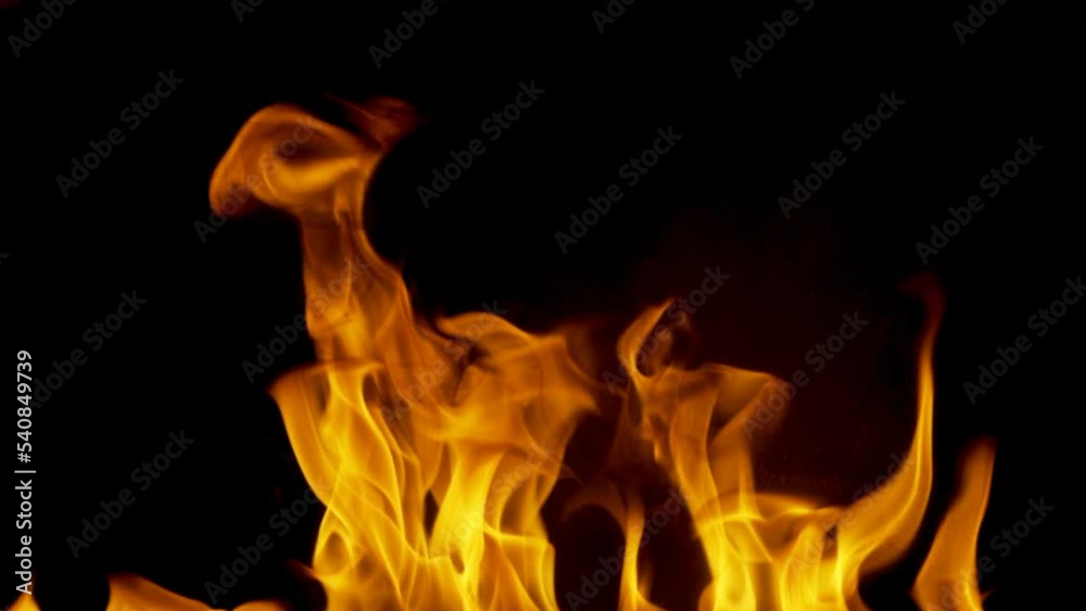 Burning fire. Bonfire. Closeup of flames burning slow motion effect background footage motion graphics, or as a background or overlay 4K 