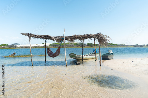 Boats and net in the lagoon, Lençois Maranhenses, Brazil  photo