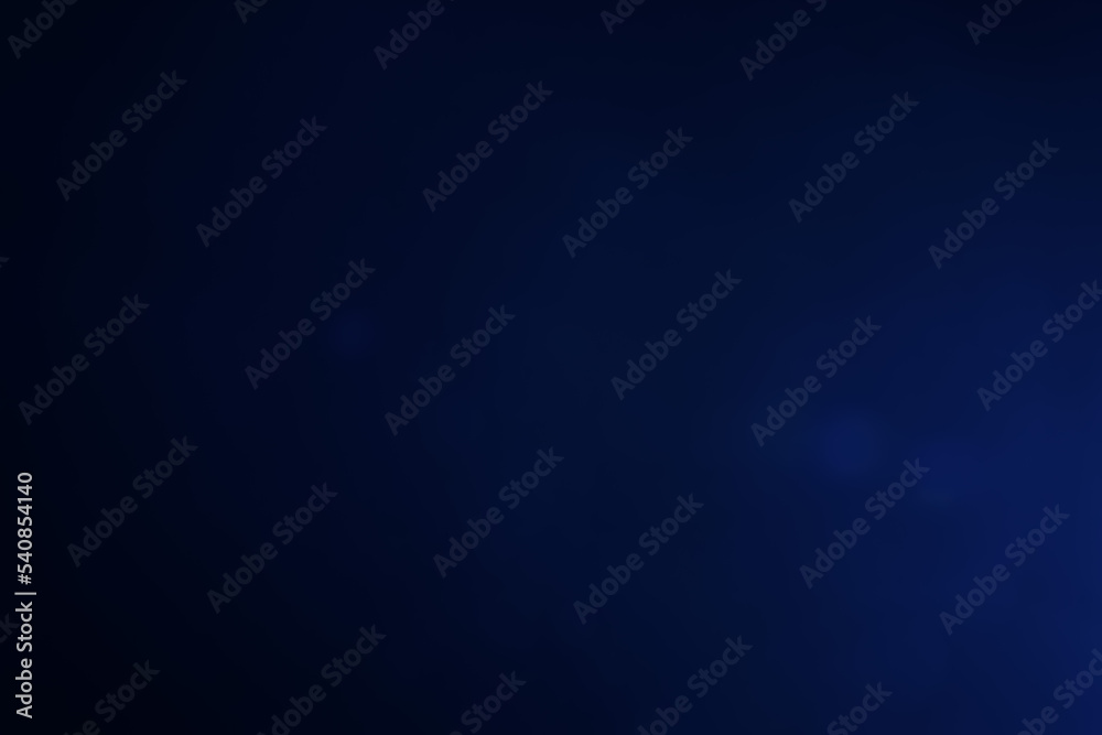 A dark blue background bokeh image for used to decorate background. A dark blue background bokeh image for used to decorate background.