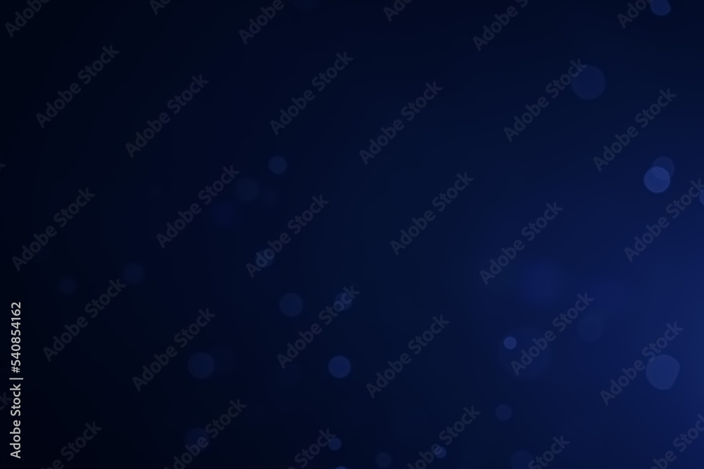 A dark blue background bokeh image for used to decorate background.