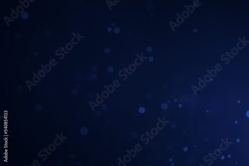 A dark blue background bokeh image for used to decorate background.