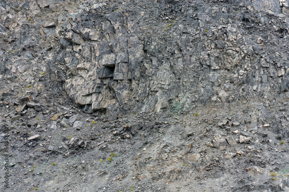 Naklejka premium Background, texture rough stones of a stone cliff