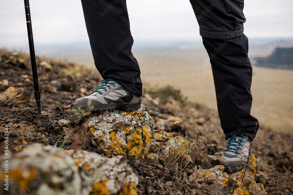 Mid adult man hiking outdoors Mid adult man hiking outdoors