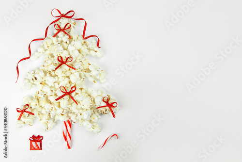 Christmas tree decorations with popcorn on white