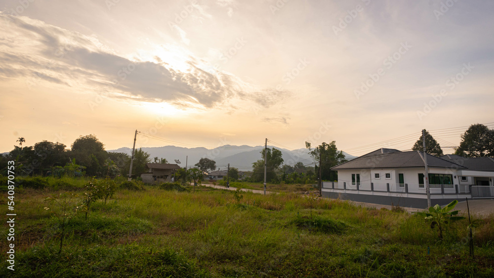 Urban home with mountain view in the Morning time. Rural road with peace