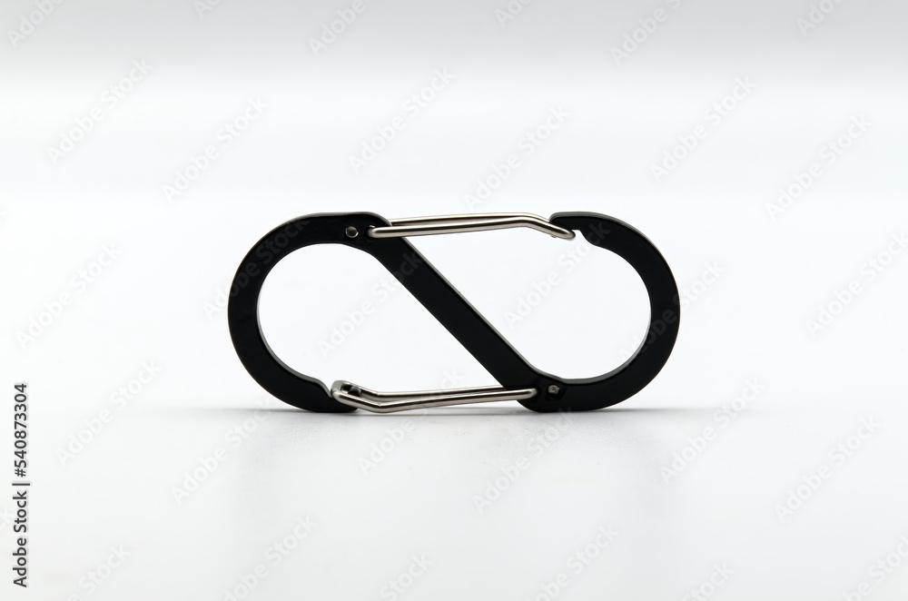 Fototapeta premium Black and silver carabiner isolated on white background