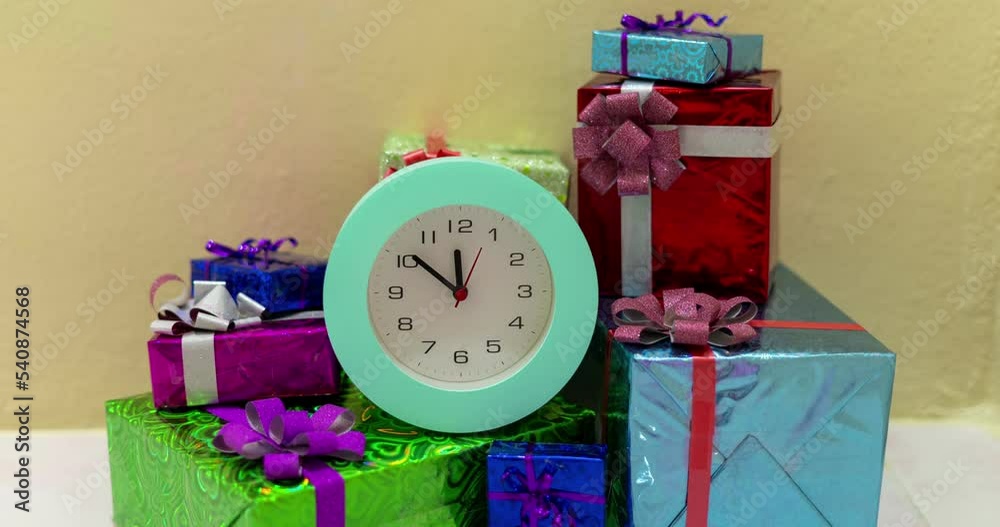 Timelapse of beautiful Alarm Clock on gift box Background, Alarm Clock Face in Time Lapse Stop motion animation indicating midnight Adorable New Year celebration,Concept countdown to the new year 2023 Timelapse of beautiful Alarm Clock on gift box Background, Alarm Clock Face in Time Lapse Stop motion animation indicating midnight Adorable New Year celebration,Concept countdown to the new year 2023