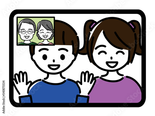 祖父母がタブレットで孫とビデオ通話をしている