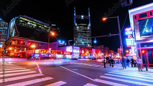 Lockdown Time Lapse Shot Of People Walking In City During Night - Nashville, Tennessee photo