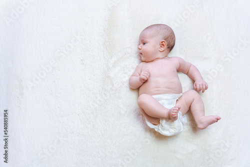 Diaper changing kid newborn banner. Happy cute infant baby in nappy. Child care white background. Concept of childhood, motherhood, life, birth. Copy space.