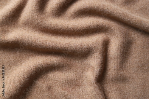 Knitted cashmere texture background. Warm sweater, pullover, jersey.