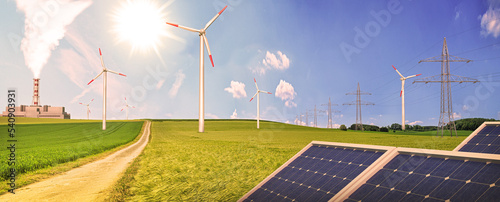 Different power generation by wind turbines,gas or nuclear power and solar panels as well as high voltage pylons in the natural landscape - 3d illustration photo