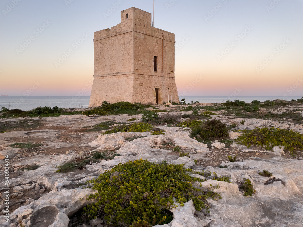 Naxxar, Malta - October 24th 2022:  Saint Mark's Tower on the shore of the Mediterranean Sea  was completed in 1658 and is the third of the De Redin towers to be built by the Order of Saint John.