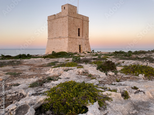 Naxxar, Malta - October 24th 2022:  Saint Mark's Tower on the shore of the Mediterranean Sea  was completed in 1658 and is the third of the De Redin towers to be built by the Order of Saint John. photo