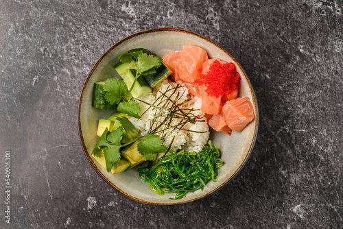 poke bowl with salmon and tobiko
