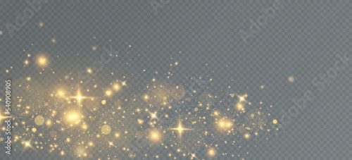 Golden sequins glow with many lights. Glittering dust. Luxurious background of golden particles.
 photo