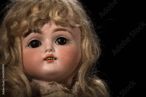 An original antique 1887 Bisque Doll handed down through three generations of family.