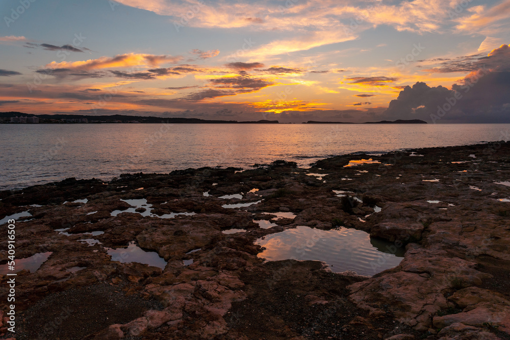 Landscape at Sunset in San Antonio Abad, Ibiza Island, Balearic. Little puddles by the sea
