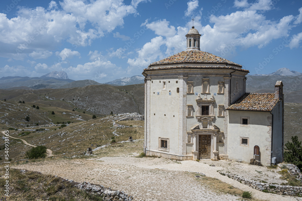 The church of Santa Maria della Pietà in Rocca Calascio with the beautiful Abruzzo mountains and hills in the background The church of Santa Maria della Pietà in Rocca Calascio with the beautiful Abruzzo mountains and hills in the background