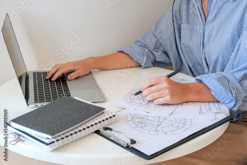 Astrology. Astrologer calculates natal chart and makes a forecast of fate.Tarot cards, Fortune telling on tarot cards magic crystal, occultism, Esoteric background. Fortune telling,tarot predictions.