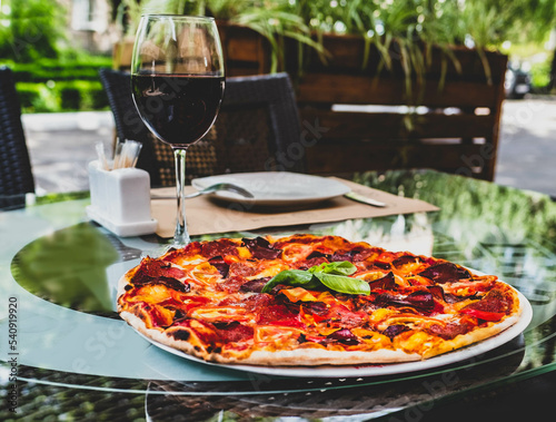 Pizza Diavolo and red wine