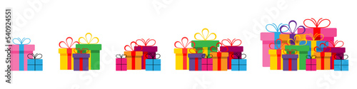 Set of colorful gift boxes with ribbons and bows.A pile of gift boxes. Presents in colorful wrapping with ribbons.Gift boxes stack in flat style.Cute present boxes on white background photo