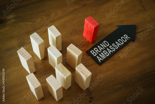 Cubes and arrow with inscription brand ambassador.