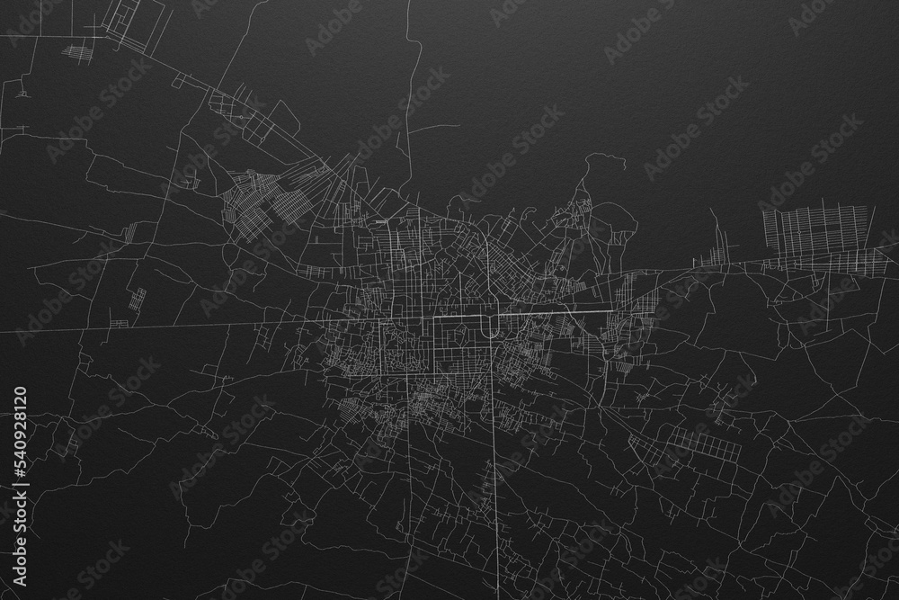 Street map of Herat (Afghanistan) on black paper with light coming from top