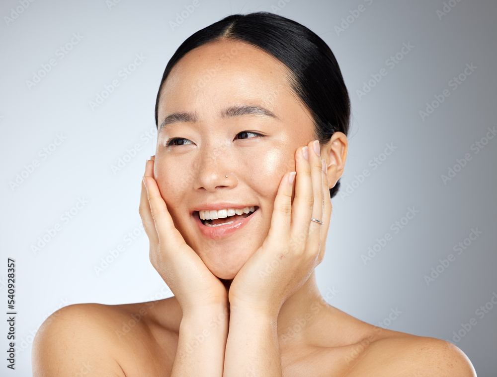 Skincare, beauty and woman with smile for dermatology against a grey mockup studio background. Face of a happy, relax and Asian model excited about facial care, wellness of skin and cosmetics Skincare, beauty and woman with smile for dermatology against a grey mockup studio background. Face of a happy, relax and Asian model excited about facial care, wellness of skin and cosmetics