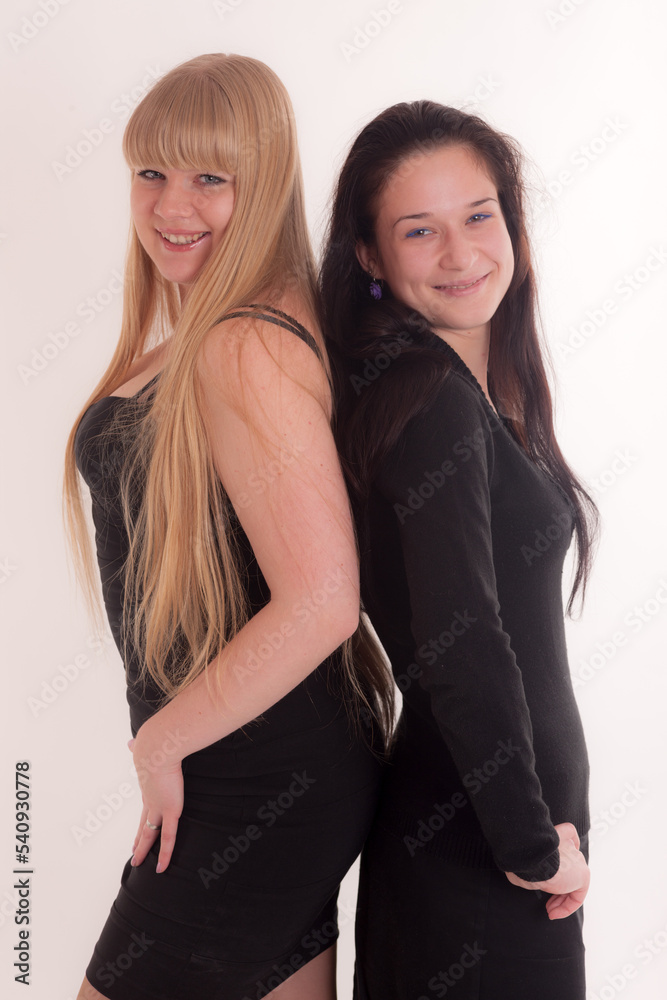 two girls on a white background two girls on a white background